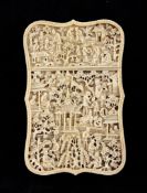 A Chinese export ivory card case, 19th century, carved in high relief with figures and animals