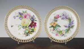 A pair of Royal Worcester plates, late 19th century, painted by David Bates, with bouquets of