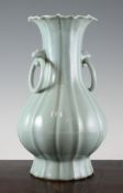 A Japanese celadon glazed lobed baluster vase, 20th century, modelled in Longquan celadon style with