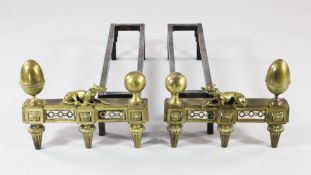 A pair of 19th century gilt bronze chenets, each mounted with reclining hounds, with pierced