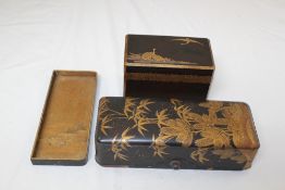 Two Japanese lacquer boxes and a tray, decorated in takamaki-e, 19th century, the first a