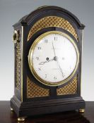 James Tregent, London. A George III brass mounted ebonised hour repeating bracket clock, with arched