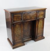 An early 19th century mahogany sideboard, with single deep secretaire drawer above recessed panel