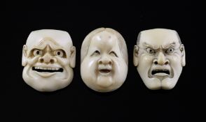 Three Japanese ivory noh mask netsuke, 19th century, in the form Okame and two male characters, 4.