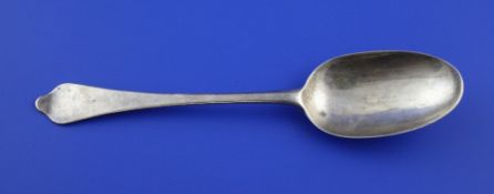 A Queen Anne Britannia standard silver dog nose spoon, with engraved initials, maker probably John