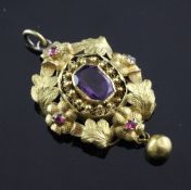 A Victorian gold, ruby and amethyst drop pendant, of oval form, with central amethyst and ruby set