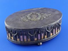 A 1930`s Latvian 875 standard silver mounted oval trinket casket, with hinged lid and pierced arch