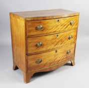 A 19th century satinwood bowfront chest, of three long drawers, on swept bracket feet, W,2ft 10in.