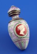 A 19th century French silver and polychrome enamel scent bottle, of ovoid form, decorated with