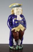 A Minton majolica Toby jug, late 19th century, the figure modelled with his hands in his pockets,