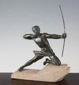 A Max Le Verrier Art Deco figure of a kneeling male archer, on stepped base, signed, 7.9in.