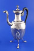 An early 19th century French 950 standard silver coffee pot, of baluster vase form, with horse