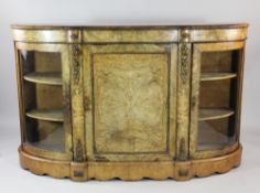 A Victorian walnut and marquetry inlaid credenza, with ormolu mounts and central cupboard door