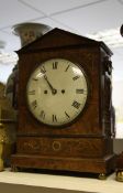 A 19th century mahogany bracket clock, with architectural pediment and inlaid decoration and