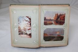 A late 19th / early 20th century postcard album, containing approximately one hundred and twelve