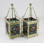 A pair of Victorian gilt brass and stained glass rectangular hall lanterns, coloured glass panels