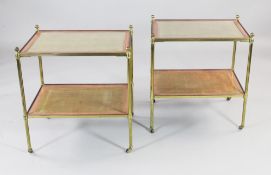 A pair of lacquered brass two tier occasional tables, with pink and gold painted tops and castor