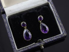 A pair of 18ct gold and amethyst teardrop shaped earrings, 0.75in.