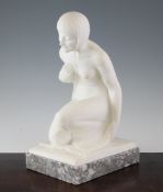 An Art Deco white marble figure of a crouching woman, on white marble and grey marble rectangular