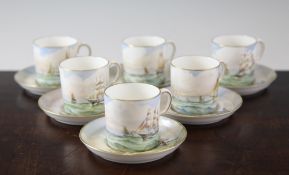 A set of six Royal Crown Derby `Maritime` coffee cans and saucers, c.1939, painted by W.E.J. Dean,