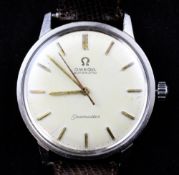A gentleman`s 1960`s stainless steel Omega Seamaster automatic wrist watch, with baton numerals,