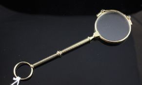 A 1920`s 14ct gold lorgnette, with engraved handled, 1922-1925 Austrian gold import mark, 5.5in.