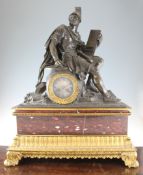 A 19th century French bronze, ormolu and rouge marble mantel clock, of impressive proportions,