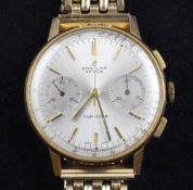 A gentleman`s steel and gold plated Breitling Top Time chronograph manual wind wrist watch, with
