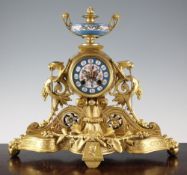 A 19th century French gilt metal and porcelain mantel clock, 14in.