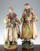 Two 19th century Neapolitan creche figures, of standing female figures dressed in brocade and