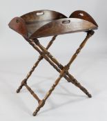 A 19th century mahogany butler`s tray and stand, with brass hinged folding sides, extended W.2ft