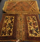 A Caucasian rug, with stepped diamond motifs on a polychrome ground, with three row border, 4ft by