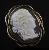 A Victorian gold mounted cameo brooch, carved with the head of a lady to sinister, 2.75in.
