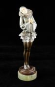 Paul Philippe. An Art Deco cold painted bronze and ivory figure modelled as a standing girl, in