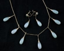 A suite of 14ct gold and jadeite set jewellery, comprising drop necklace, with seven pear shaped