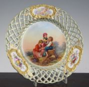A Minton Sevres style plate, painted by James Rouse, with a titled scene `The Kind Sisters`,