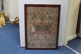 A 19th century mahogany framed needlework sampler, with the initials ID and AD, possibly for Ann