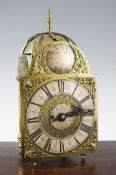 A Victorian brass lantern clock, with silvered Roman chapter ring signed Geo. Spur, Aylesbury and