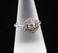 An Art Deco style 18ct gold and diamond cluster ring, of hexagonal form, the central stone