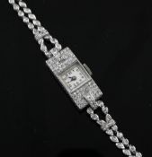 A lady`s 1940`s? platinum and diamond Rolex manual wind cocktail watch, with rectangular Arabic dial