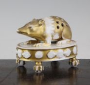 A Paris porcelain `porcupine` quill holder, first half 19th century, on an oval base and four claw