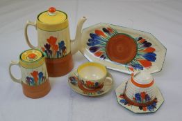 Clarice Cliff Crocus pattern tea and coffee wares, and a similar honey pot and cover, comprising a