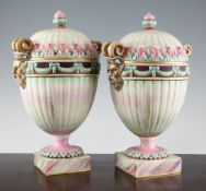 A pair of Kerr & Binns, Worcester, porcelain oviform vases and covers, late 19th century, each of