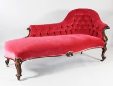 A Victorian rosewood chaise longue, with single buttoned scroll end, with scroll arms and legs