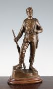 Carl Theodore Wegener (Danish, 1862-1935). A bronze figure of a standing infantry soldier, signed C.