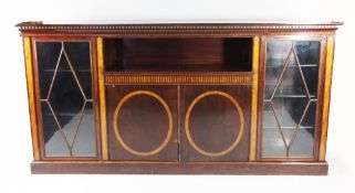 An Edwardian mahogany and satinwood inlaid dwarf bookcase, with dentil cornice, two astragal