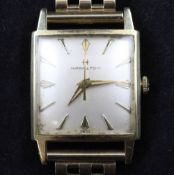 A gentleman`s 1940`s? 14ct gold Hamilton manual wind wrist watch, with square dial and baton
