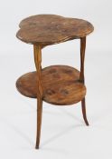 A Louis Majorelle Art Nouveau inlaid two tier occasional table, with trefoil top and conforming