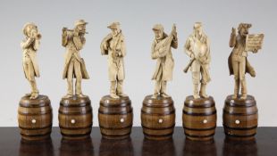 Six 19th century Bavarian carved ivory musician figures, on turned barrel bases, 6.25in.