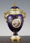 A Coalport two handled vase and cover, c.1900, painted by E.O. Ball with a named vignette of Loch